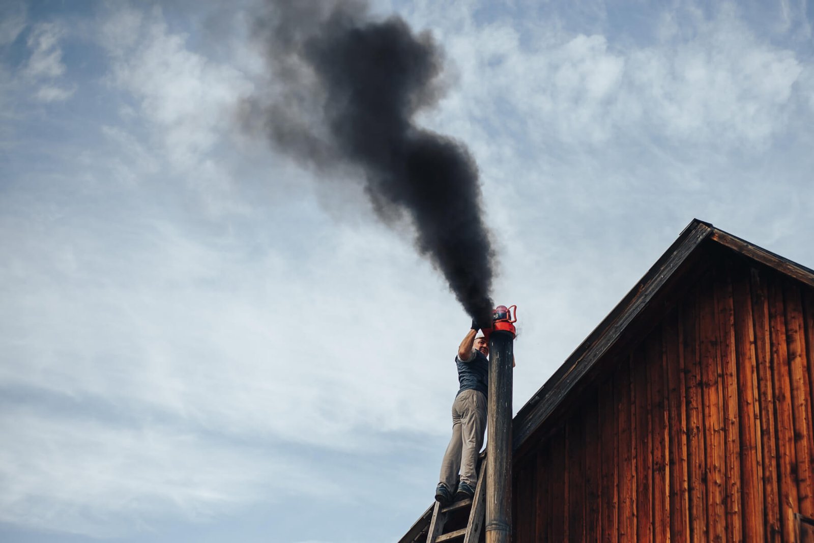 Why Is My Chimney Smoking? 5 Causes & Professional Solutions